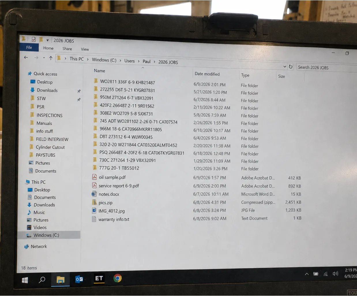 Technician laptop showing private machine and work-order folders